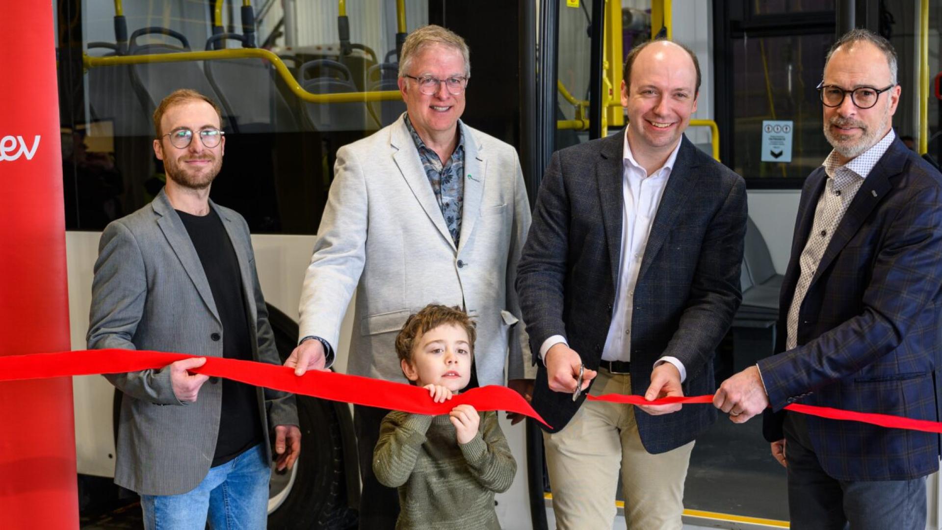 Inauguration facility in Beloeil, Canada with people cutting a ribbon