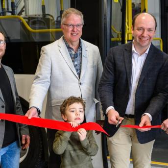 Inauguration facility in Beloeil, Canada with people cutting a ribbon