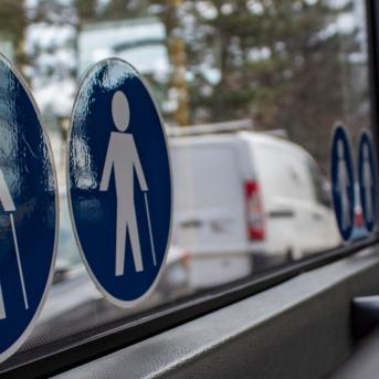 Pictograms on a bus side window
