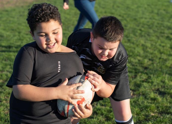 Kids playing Rugby