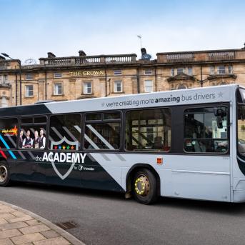 The Academy by Transdev training bus