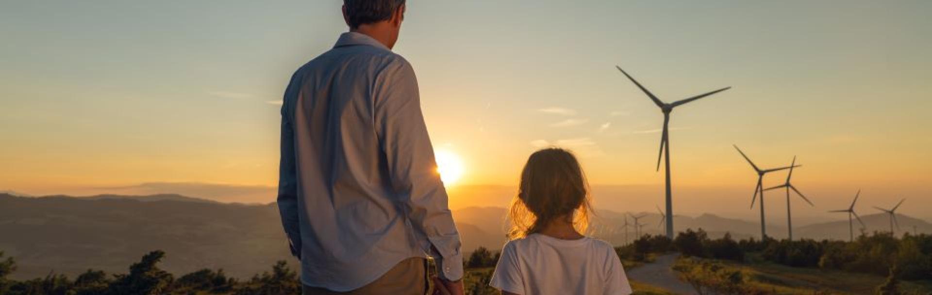 The Mobility Sphere Homme et enfant observant des éoliennes
