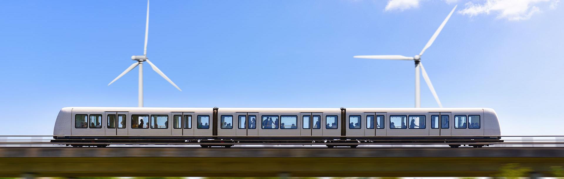 Moving train with wind turbines in the back