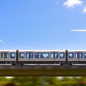 Moving train with wind turbines in the back