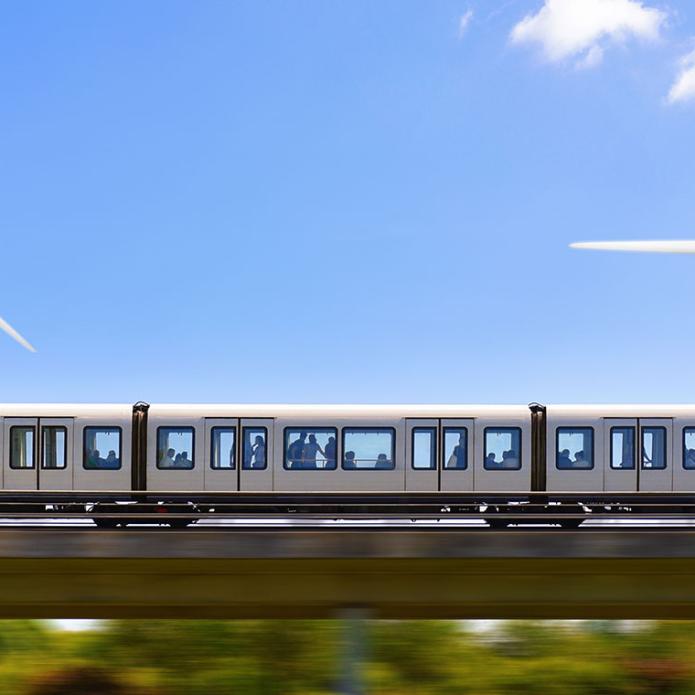 Moving train with wind turbines in the back