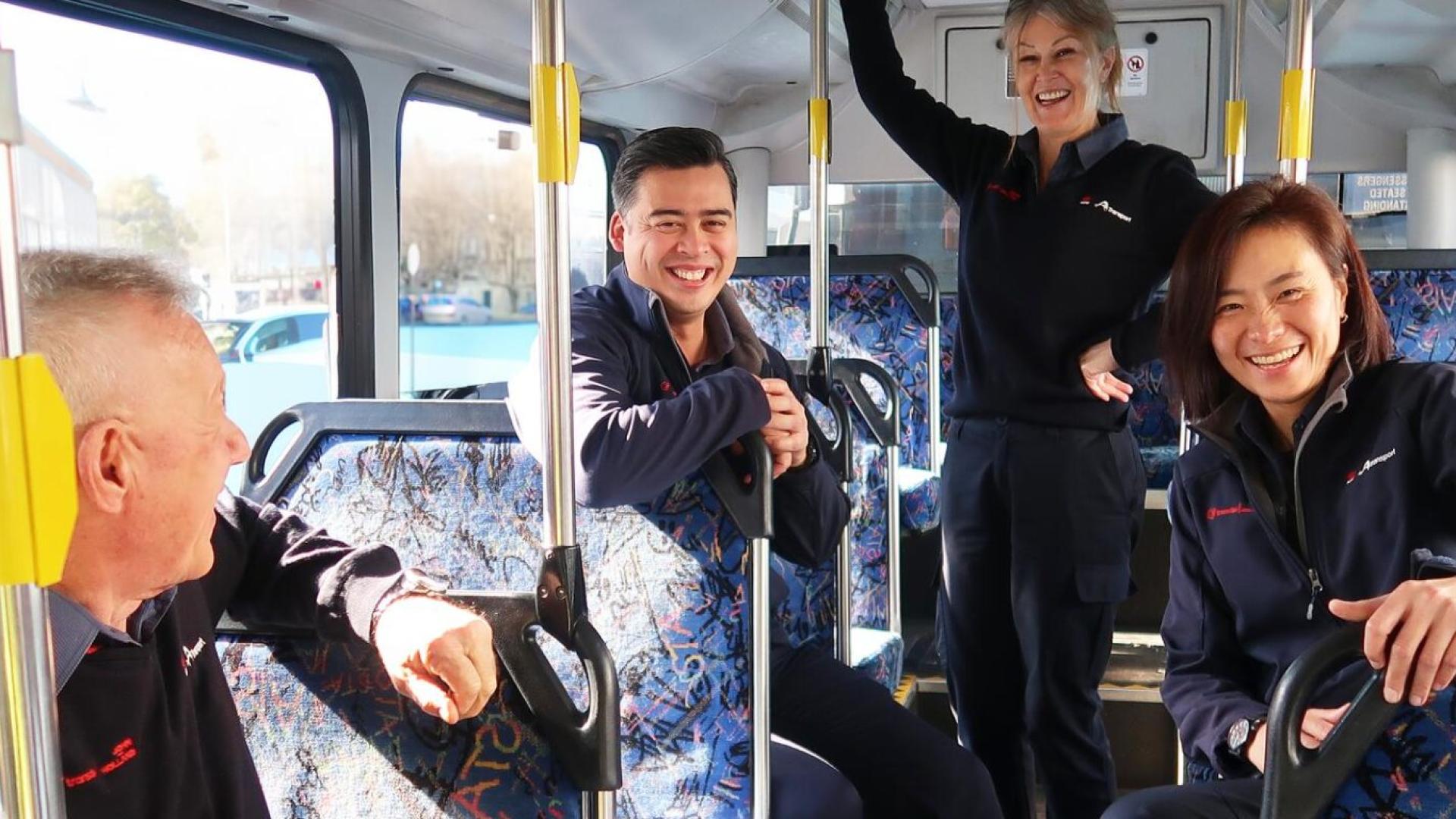 Transdev Australia gender equality with men and women staff in a bus