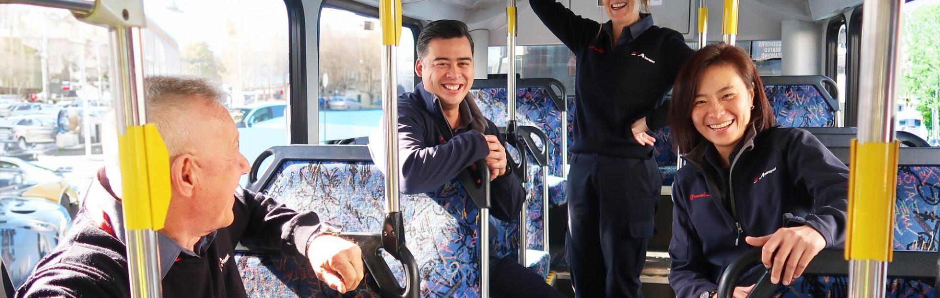 Transdev Australia gender equality with men and women staff in a bus