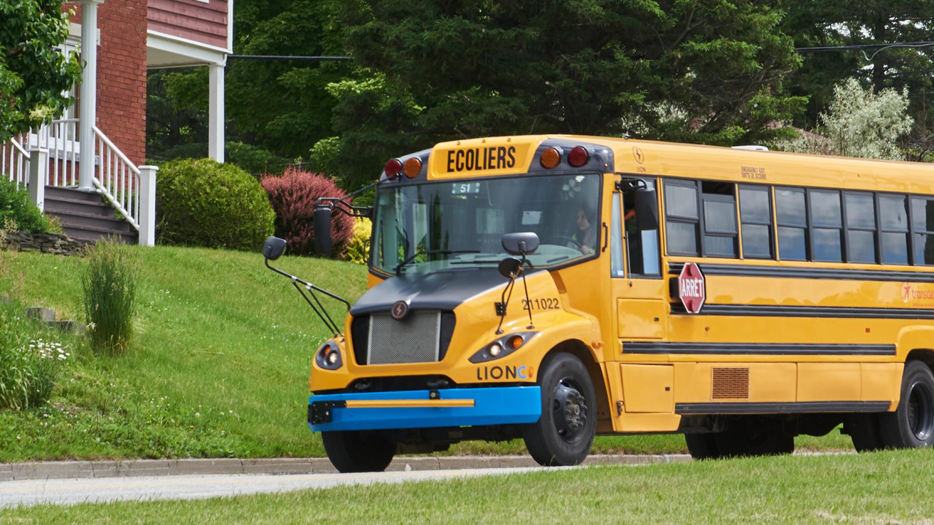 Yellow school bus for student transport in Boucherville, Quebec, operated for safe and reliable service