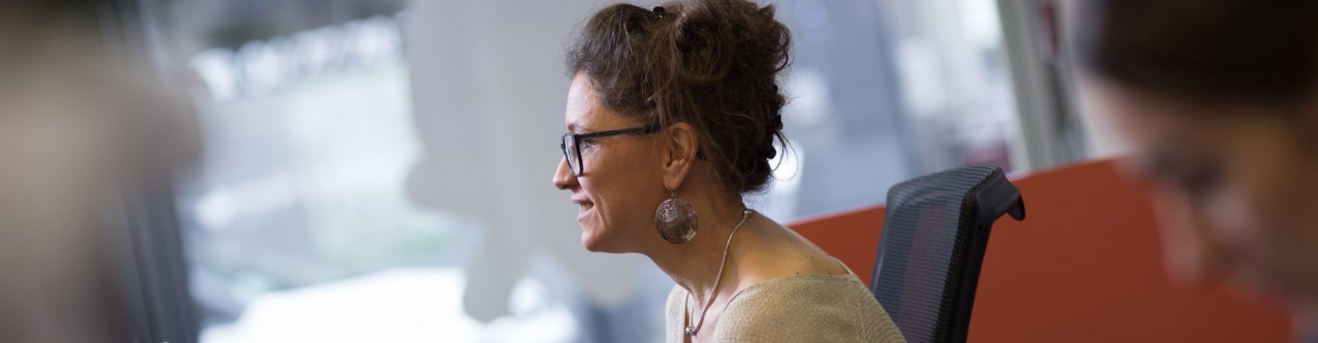 human resources manager working on her computer in her office