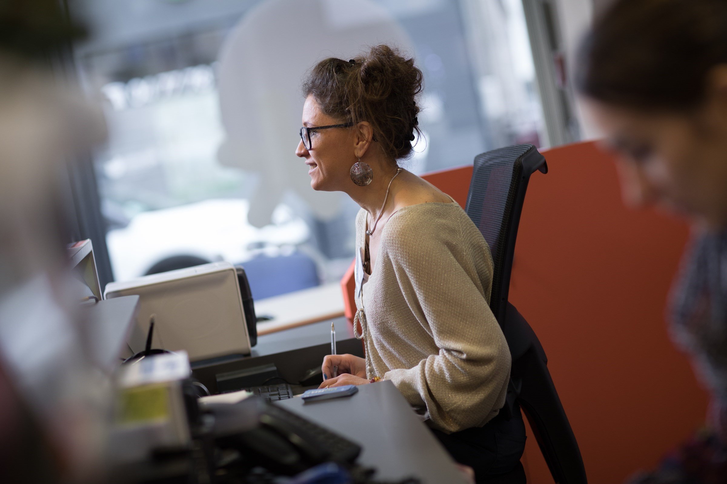 human resources manager working on her computer in her office