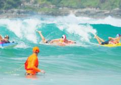 People surfing in the sea in Australia