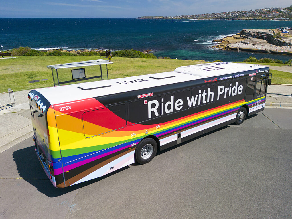 Colorful bus with a Sydney World Pride covering all over
