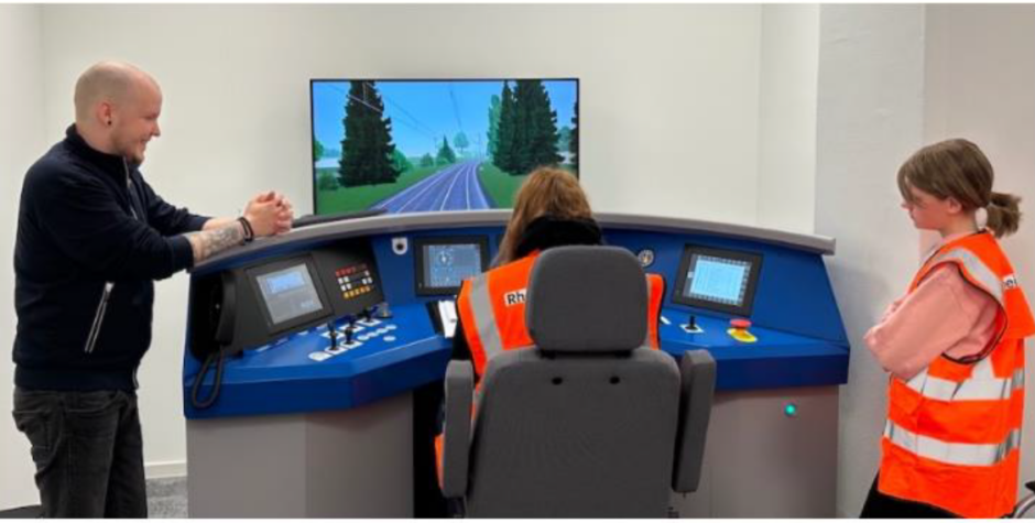 A girl on a simulator on Transdev Germany's Girl's Day