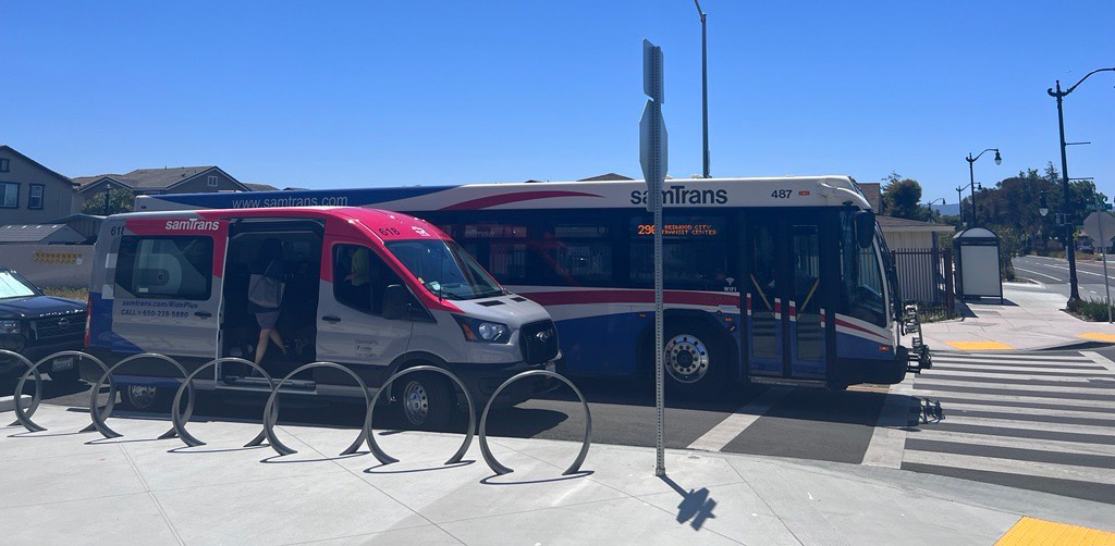 Two San Mateo County Transit District (SamTrans) vehicles